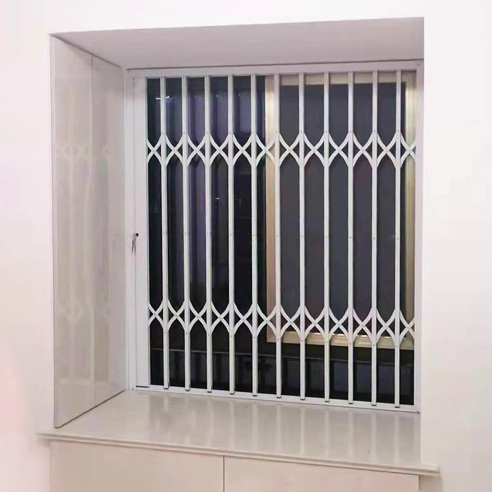 Griglia di sicurezza per finestre, regolabile, bloccabile, protezione antifurto per uso interno ed esterno, barriera di sicurezza pieghevole, per balconi e cantine (larghezza 120 x altezza 180 cm)